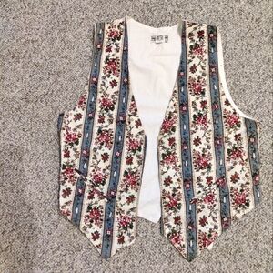 Vintage adorable floral vest with pearl embellishments . Women's size small.